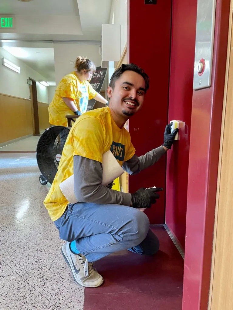 team member cleaning