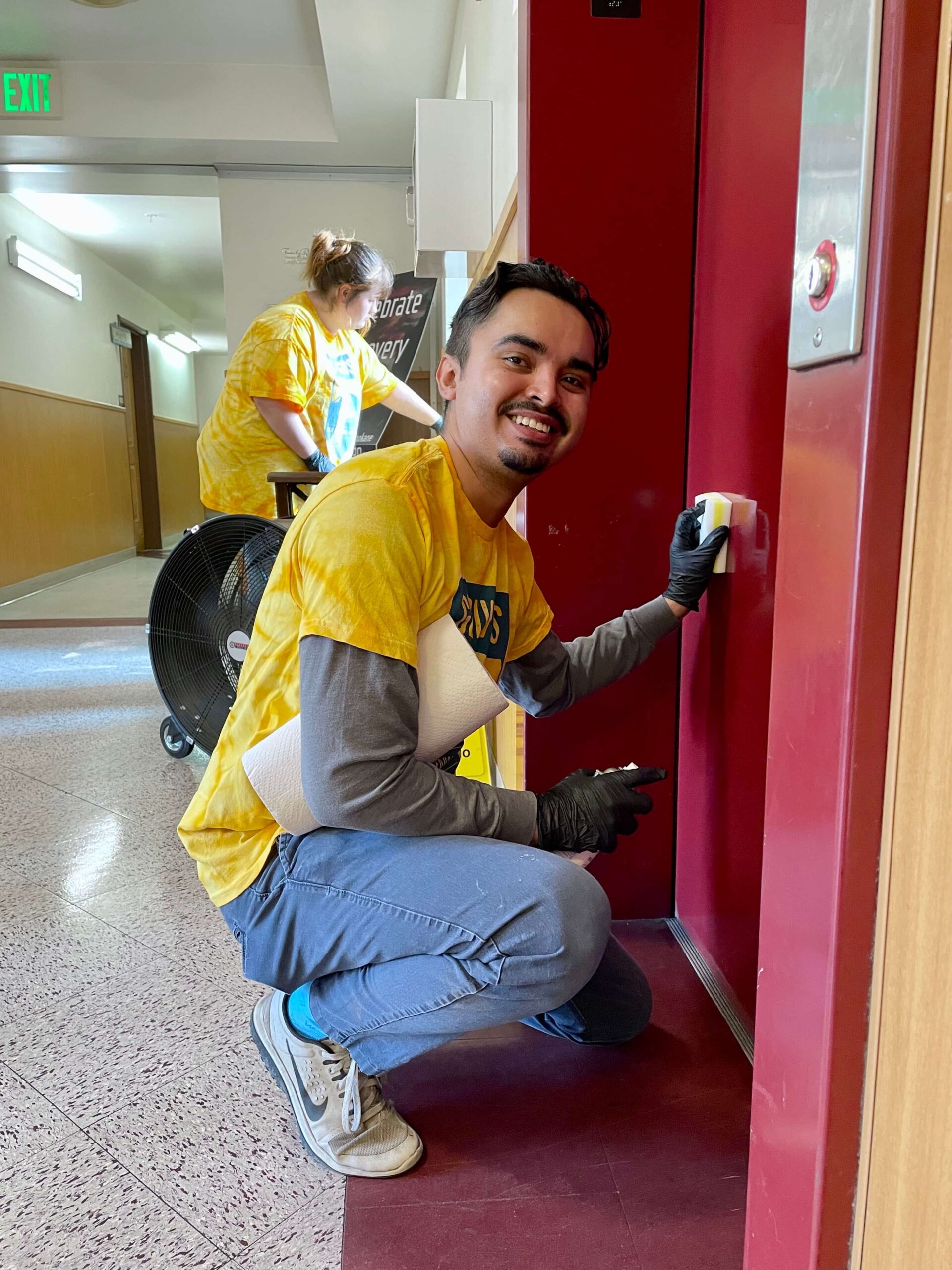 team member cleaning